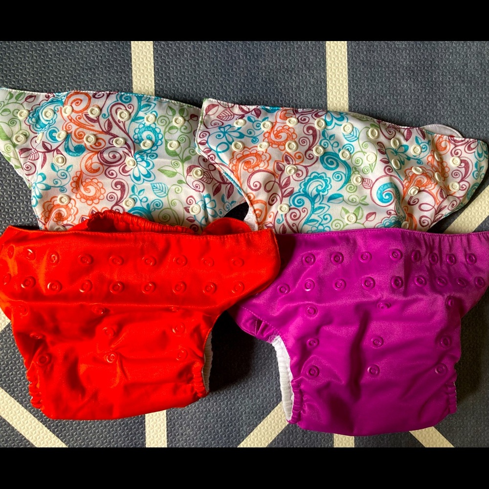 Four BumGenius cloth diapers 8-35 lbs